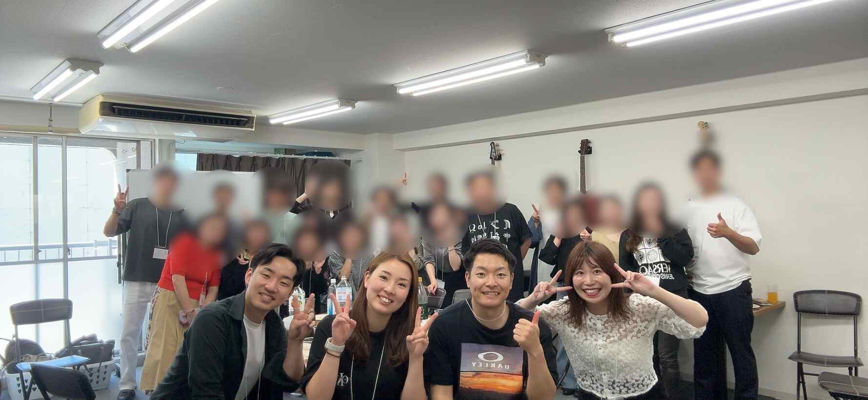 大阪堀江のたこ焼きパーティー交流会に参加した皆さんの集合写真